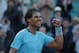 Spain's Rafael Nadal celebrates winning the quarterfinal match of the French Open tennis tournament against compatriot David Ferrer at the Roland Garros stadium, in Paris, France, Wednesday, June 4, 2014. Nadal won in four sets 4-6, 6-4, 6-0, 6-1. (AP Photo/Michel Euler)