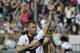 Parma's Antonio Cassano waves to supporters at the end of Serie A soccer match against Sampdoria, at Parma's Tardini stadium, Italy, Sunday, May 4, 2014. Parma won 2-0. (AP Photo/Marco Vasini)