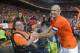 Dutch player Arjen Robben greets fans after the match against Wales at ArenA stadium in Amsterdam, Netherlands, Wednesday June 4, 2014. (AP Photo/Ermindo Armino)