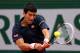 PARIS, FRANCE - JUNE 03: Novak Djokovic of Serbia returns a shot during his men's singles match against Milos Raonic of Canada on day ten of the French Open at Roland Garros on June 3, 2014 in Paris, France. (Photo by Clive Brunskill/Getty Images)