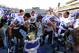Nov 30, 2013; Chapel Hill, NC, USA; Duke Blue Devils tight end Braxton Deaver (89) and linebacker Kyler Brown (56) and guard Dave Harding (74) and wide receiver Max McCaffrey (87) and wide receiver Brandon Braxton (5) and safety Christian Conway (36) and cornerback Breon Borders (31) ring the victory bell after the game. The Blue Devils defeated the North Carolina Tar Heels 27-25 at Kenan Memorial Stadium. Mandatory Credit: Bob Donnan-USA TODAY Sports