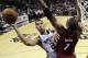 San Antonio Spurs forward Tim Duncan (21) shoots over Miami Heat center Chris Bosh (1) during the first half in Game 1 of the NBA basketball finals on Thursday, June 5, 2014, in San Antonio. (AP Photo/Eric Gay, Pool)