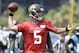 Jacksonville Jaguars quarterback Blake Bortles throws a pass during an NFL organized team activities football practice in Jacksonville, Fla., Tuesday, May 27, 2014. (AP Photo/John Raoux)