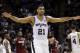 San Antonio Spurs forward Tim Duncan (21) walks down court at a break against the Miami Heat during the first half in Game 1 of the NBA basketball finals on Thursday, June 5, 2014, in San Antonio. (AP Photo/Eric Gay)