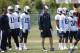 Tennessee Titans head coach Ken Whisenhunt, center, supervises a practice during NFL football rookie minicamp on Friday, May 16, 2014, in Nashville, Tenn. (AP Photo/Mark Humphrey)