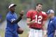 Indianapolis Colts offensive coordinator Pep Hamilton, left, works with Andrew Luck during practice at the NFL team's football training camp in Anderson, Ind., Tuesday, July 30, 2013. (AP Photo/Michael Conroy)