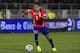 Chile's Alexis Sanchez, goes for a ball during an international friendly soccer match against against Northern Ireland, in Valparaiso, Chile, Wednesday, June 4, 2014. (AP Photo/Luis Hidalgo)