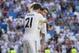 Real Madrid's Angel Di Maria from Argentina, right, celebrates his goal with teammate Alvaro Morata during a Spanish La Liga soccer match between Real Madrid and Espanyol at the Santiago Bernabeu stadium in Madrid, Spain, Saturday, May 17, 2014. (AP Photo/Daniel Ochoa de Olza)