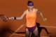 Romania's Simona Halep returns the ball during the semifinal match of the French Open tennis tournament against Germany's Andrea Petkovic at the Roland Garros stadium, in Paris, France, Thursday, June 5, 2014. Halep won in two sets 6-2, 7-6. (AP Photo/Michel Spingler)