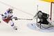 New York Rangers left wing Carl Hagelin, of Sweden, scores past Los Angeles Kings goalie Jonathan Quick during the first period in Game 1 of the NHL hockey Stanley Cup Finals, Wednesday, June 4, 2014, in Los Angeles. (AP Photo/Mark J. Terrill)
