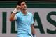 PARIS, FRANCE - JUNE 01: Novak Djokovic of Serbia celebrates victory in his men's singles match against Jo-Wilfried Tsonga of France on day eight of the French Open at Roland Garros on June 1, 2014 in Paris, France. (Photo by Matthew Stockman/Getty Images)