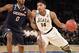 Mar 30, 2014; New York, NY, USA; Michigan State Spartans guard Gary Harris (14) drives to the basket against Connecticut Huskies de Phillip Nolan (0) during the second half in the finals of the east regional of the 2014 NCAA Mens Basketball Championship tournament at Madison Square Garden. Mandatory Credit: Robert Deutsch-USA TODAY Sports