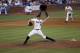 United States pitcher Carlos Rodon throws against Cuba during an exhibition baseball game in Durham, N.C., Tuesday, July 23, 2013. (AP Photo/Gerry Broome)