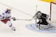 New York Rangers left wing Carl Hagelin, of Sweden, scores past Los Angeles Kings goalie Jonathan Quick during the first period in Game 1 of the NHL hockey Stanley Cup Finals, Wednesday, June 4, 2014, in Los Angeles. (AP Photo/Mark J. Terrill)