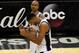 SAN ANTONIO, TX - JUNE 05: Tim Duncan #21 and Tony Parker #9 of the San Antonio Spurs celebrate after defeating the Miami Heat 110-95 in Game One of the 2014 NBA Finals at the AT&T Center on June 5, 2014 in San Antonio, Texas. NOTE TO USER: User expressly acknowledges and agrees that, by downloading and or using this photograph, User is consenting to the terms and conditions of the Getty Images License Agreement. (Photo by Chris Covatta/Getty Images)
