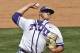 TCU's Riley Ferrell pitches in the ninth inning of a first-round game against Baylor in the Big 12 conference NCAA college baseball tournament in Oklahoma City, Wednesday, May 21, 2014. TCU won 8-5. (AP Photo/Sue Ogrocki)