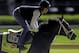 Exercise rider Patti Krotenko rides Kentucky Derby entrant Charming Kitten for a workout at Churchill Downs Friday, May 3, 2013, in Louisville, Ky. Saturday will be the 139th running of the Kentucky Derby. (AP Photo/David Goldman)