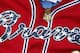 A Medal of Honor winner wears his medal over a special Atlanta Braves jersey as the team horrid seven Medal of Honor winners before a baseball game against the Seattle Mariners Tuesday, June 3, 2014 in Atlanta. (AP Photo/John Bazemore)