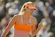 Jun 5, 2014; Paris, France; Maria Sharapova (RUS) reacts during her match against Eugenie Bouchard (CAN) on day 12 at the 2014 French Open at Roland Garros. Mandatory Credit: Susan Mullane-USA TODAY Sports