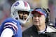 FILE - In this Nov. 17, 2013 file photo, Buffalo Bills head coach Doug Marrone, right, and Buffalo Bills quarterback EJ Manuel talk during the first half of an NFL football game against the New York Jets, in Orchard Park, N.Y. Leaving the Bills defense to new coordinator Jim Schwartz, Marrone is making the retooled EJ Manuel-led offense his primary focus during the team's spring minicamp sessions.(AP Photo/Gary Wiepert, File)