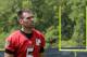 Baltimore Ravens quarterback Joe Flacco walks off the field after an NFL football practice, Wednesday, June 4, 2014, at the team's practice facility in Owings Mills, Md. (AP Photo/Patrick Semansky)