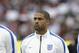England's Glen Johnson stands in a team line up during the playing of the national anthems before the international friendly soccer match between England and Peru at Wembley Stadium in London, Friday, May 30, 2014. (AP Photo/Matt Dunham)