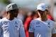 MONTREAL, QC - JUNE 06: Lewis Hamilton of Great Britain and Mercedes GP and Nico Rosberg of Germany and Mercedes GP walk across the paddock during practice ahead of the Canadian Formula One Grand Prix at Circuit Gilles Villeneuve on June 6, 2014 in Montreal, Canada. (Photo by Mathias Kniepeiss/Getty Images)