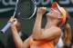 Russia's Maria Sharapova reacts as she plays Romania's Simona Halep during their final match of the French Open tennis tournament at the Roland Garros stadium, in Paris, France, Saturday, June 7, 2014. (AP Photo/Michel Euler)