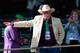 ELMONT, NY - JUNE 07: Steve Coburn, co-owner of California Chrome waves to fans at Belmont Park on June 7, 2014 in Elmont, New York. California Chrome will be attempting to win the triple crown in the Belmont Stakes. (Photo by Mike Ehrmann/Getty Images)