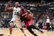 SAN ANTONIO, TX - JUNE 5: LeBron James #6 of the Miami Heat drives against Boris Diaw #33 of the San Antonio Spurs in Game One of the 2014 NBA Finals at AT&T Center on June 5, 2014 in San Antonio, Texas. NOTE TO USER: User expressly acknowledges and agrees that, by downloading and/or using this photograph, user is consenting to the terms and conditions of the Getty Images License Agreement. Mandatory Copyright Notice: Copyright 2014 NBAE (Photo by Nathaniel S. Butler/NBAE via Getty Images)