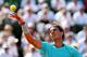 PARIS, FRANCE - JUNE 06: Rafael Nadal of Spain serves during his men's singles match against Andy Murray of Great Britain on day thirteen of the French Open at Roland Garros on June 6, 2014 in Paris, France. (Photo by Matthew Stockman/Getty Images)