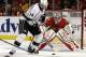 Los Angeles Kings right wing Justin Williams (14) attempts to shoot against Chicago Blackhawks goalie Corey Crawford (50) during the first period in Game 7 of the Western Conference finals in the NHL hockey Stanley Cup playoffs Sunday, June 1, 2014, in Chicago. (AP Photo/Nam Y. Huh)