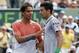Mar 30, 2014; Miami, FL, USA; Novak Djokovic (right) shakes hands with Rafael Nadal (left) after winning the men's singles final of the Sony Open at Crandon Tennis Center. Djokovic won 6-3, 6-3. Mandatory Credit: Geoff Burke-USA TODAY Sports