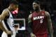 Jun 5, 2014; San Antonio, TX, USA; Miami Heat forward LeBron James (6) talks to San Antonio Spurs forward Tim Duncan (21) during the second quarter in game one of the 2014 NBA Finals at AT&T Center. Mandatory Credit: Soobum Im-USA TODAY Sports