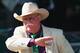 ELMONT, NY - JUNE 07: Steve Coburn, co-owner of California Chrome waves to fans at Belmont Park on June 7, 2014 in Elmont, New York. California Chrome will be attempting to win the triple crown in the Belmont Stakes. (Photo by Mike Ehrmann/Getty Images)