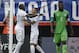 United States's Jozy Altidore, left, celebrates with teammate Fabian Johnson (23) after scoring a goal against Nigeria as Nigeria's Joseph Yobo (2) walks away during the first half of an international friendly soccer match in Jacksonville, Fla., Saturday, June 7, 2014. (AP Photo/John Raoux)