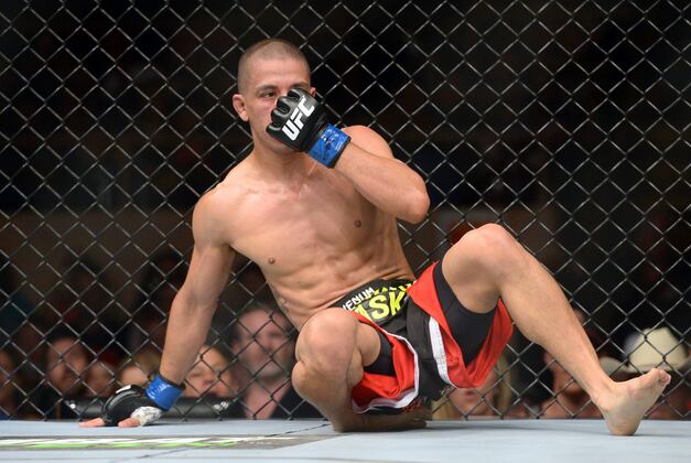 John Moraga Unable to Answer Bell Against John Dodson After Broken Nose