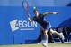 Andy Murray of Britain plays a return to Marin Cilic of Croatia during their Queen's Club grass court championships single final tennis match in London, Sunday, June 16, 2013. (AP Photo/Sang Tan)