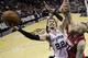 San Antonio Spurs center Tiago Splitter (22) shoots as Miami Heat forward Chris Andersen (11) defends during the first half in Game 1 of the NBA basketball finals on Thursday, June 5, 2014, in San Antonio. (AP Photo/Eric Gay)
