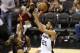 SAN ANTONIO, TX - JUNE 8: Tim Duncan #21 of the San Antonio Spurs shoots the ball against the Miami Heat during Game Two of the 2014 NBA Finals on June 8, 2014 at AT&T Center in San Antonio, Texas. NOTE TO USER: User expressly acknowledges and agrees that, by downloading and or using this photograph, User is consenting to the terms and conditions of the Getty Images License Agreement. Mandatory Copyright Notice: Copyright 2014 NBAE (Photo by Joe Murphy/NBAE via Getty Images)