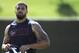 Houston Texans running back Arian Foster heads to the practice field during NFL football training Monday, June 2, 2014, in Houston. (AP Photo/Pat Sullivan)