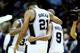SAN ANTONIO, TX - JUNE 05: Tim Duncan #21 and Tony Parker #9 of the San Antonio Spurs celebrate after defeating the Miami Heat 110-95 in Game One of the 2014 NBA Finals at the AT&T Center on June 5, 2014 in San Antonio, Texas. NOTE TO USER: User expressly acknowledges and agrees that, by downloading and or using this photograph, User is consenting to the terms and conditions of the Getty Images License Agreement. (Photo by Andy Lyons/Getty Images)