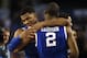 Apr 5, 2014; Arlington, TX, USA; Kentucky Wildcats guard Andrew Harrison (left) hugs guard Aaron Harrison (2) after defeating the Wisconsin Badgers in the semifinals of the Final Four in the 2014 NCAA Mens Division I Championship tournament at AT&T Stadium. Mandatory Credit: Robert Deutsch-USA TODAY Sports