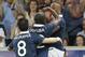 French soccer Karim Benzema , center,reacts after scoring against Jamaica with Blaise Matuidi, left, and teamates during the friendly soccer match between France and Jamaica at the Lille Metropole stadium, in Villeneuve d'Ascq, northern France, Sunday, June 8, 2014. France are preparing for the upcoming FIFA soccer World Cup in Brazil starting on 12 June. (AP Photo/Jacques Brinon)