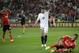 Sevilla's Alberto Moreno reacts next to Benfica's Lima during the Europa League soccer final between Sevilla and Benfica, at the Turin Juventus stadium in Turin, Italy, Wednesday, May 14, 2014. (AP Photo/Andrew Medichini)
