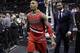 Portland Trail Blazers' Damian Lillard (0) walks off the court following the team's loss in Game 5 of a Western Conference semifinal NBA basketball playoff series, Wednesday, May 14, 2014, in San Antonio. San Antonio won 104-82. (AP Photo/Eric Gay)