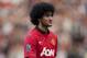 Manchester United's Marouane Fellaini walks from the pitch after his team's English Premier League soccer match against West Bromwich Albion at Old Trafford Stadium, Manchester, England, Saturday Sept. 28, 2013. (AP Photo/Jon Super)