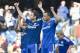 Chelsea's John Terry, right, Frank Lampard, center, and Joe Cole salute the fans as they walk around the pitch with their children at the end of their English Premier League soccer match against Norwich City, at the Stamford Bridge Stadium in London, Sunday, May 4, 2014. (AP Photo/Bogdan Maran)