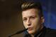 Dortmund's Marco Reus speaks during a press conference at the Santiago Bernabeu stadium in Madrid, Spain, Tuesday, April 1, 2014. Borussia Dortmund will face Real Madrid in a first leg quarterfinal Champions League soccer match April 2. (AP Photo/Andres Kudacki)