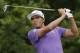 Rickie Fowler watches his tee shot on the eighth hole during the second round of the PGA Colonial golf tournament in Fort Worth, Texas, Friday, May 23, 2014. (AP Photo/LM Otero)